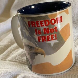 “FREEDOM isn’t free” coffee mug